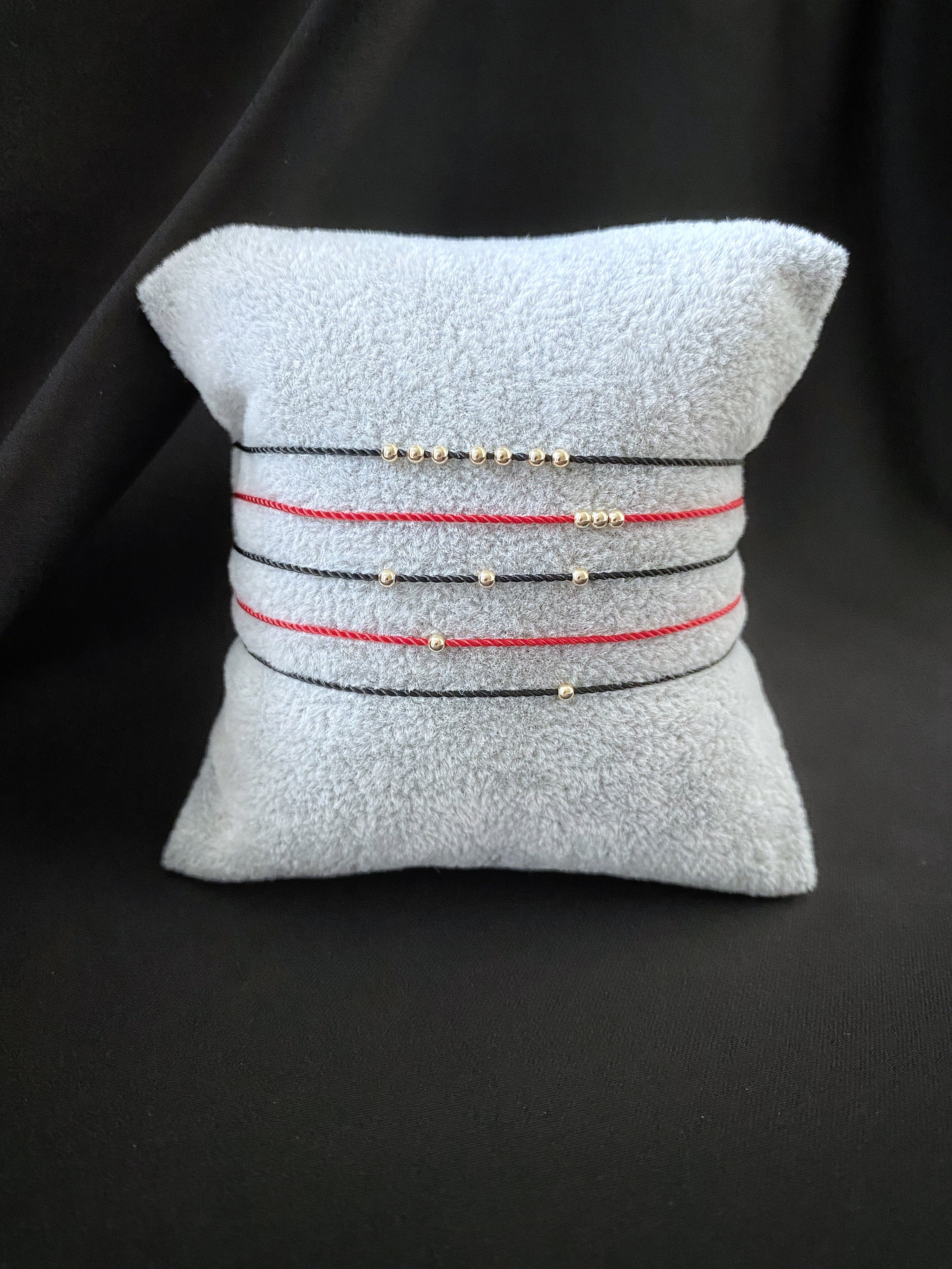 Tangle yourself gold bead bracelet