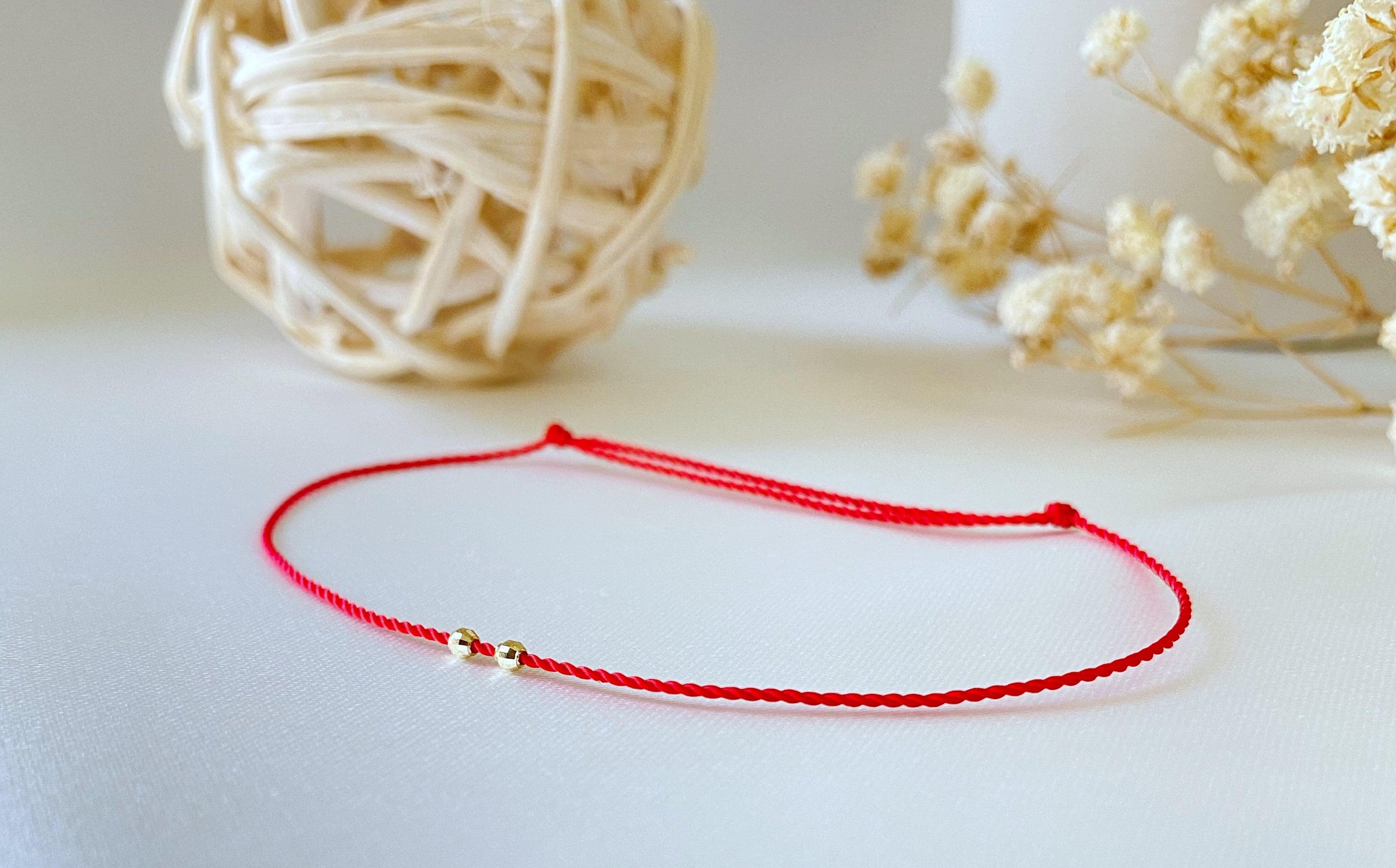 Armband aus zwei diamantgeschliffenen Perlen