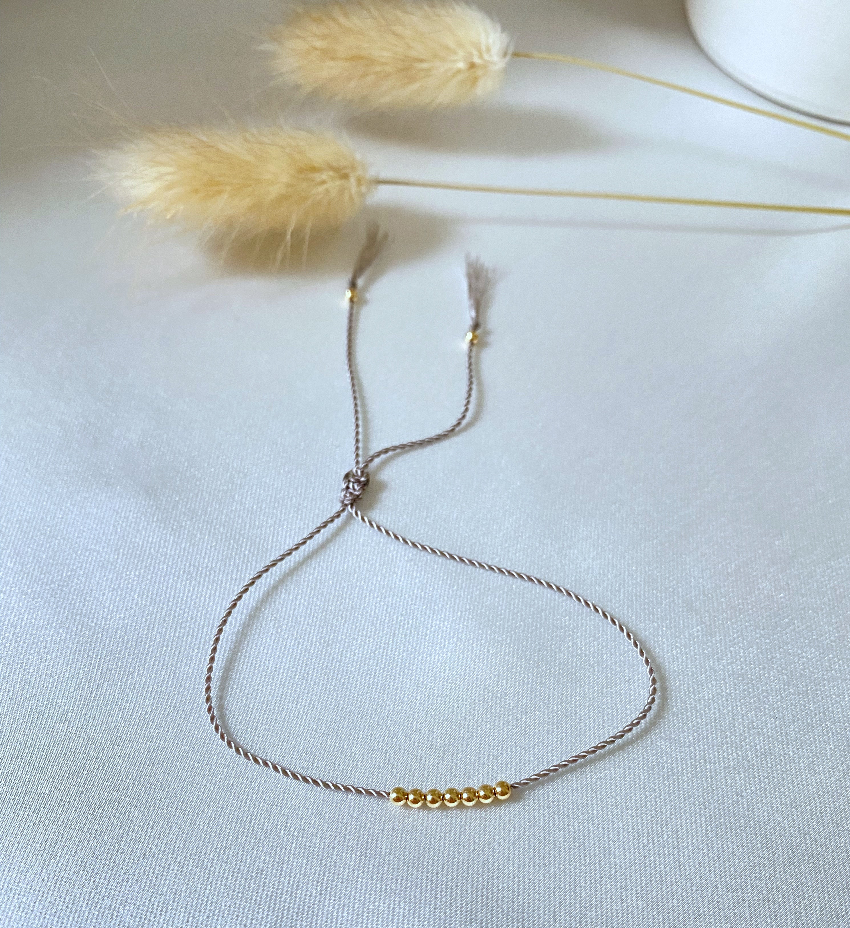 Seven gold beads bracelet - macrame
