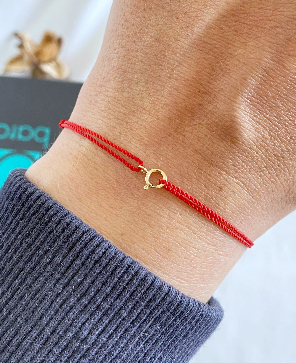 PULSERA KARMA DE ORO BLANCO