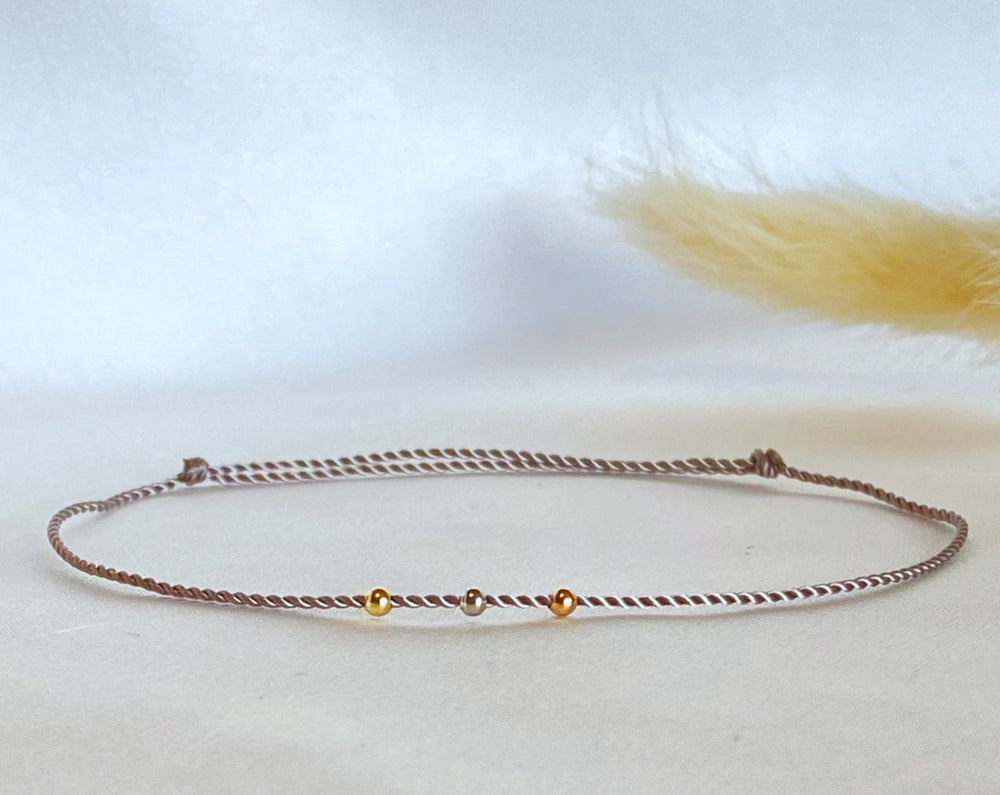 Mix of three gold beads bracelet