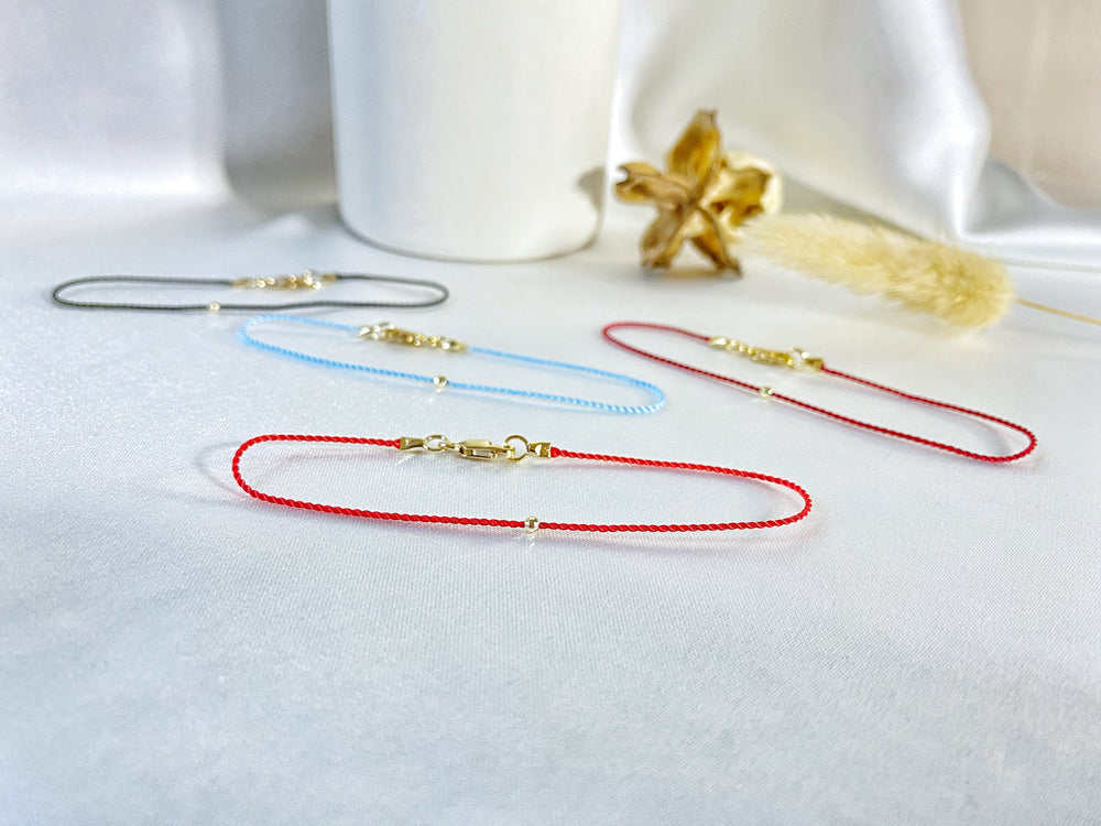 Lobster clasp and 14k gold bead bracelet