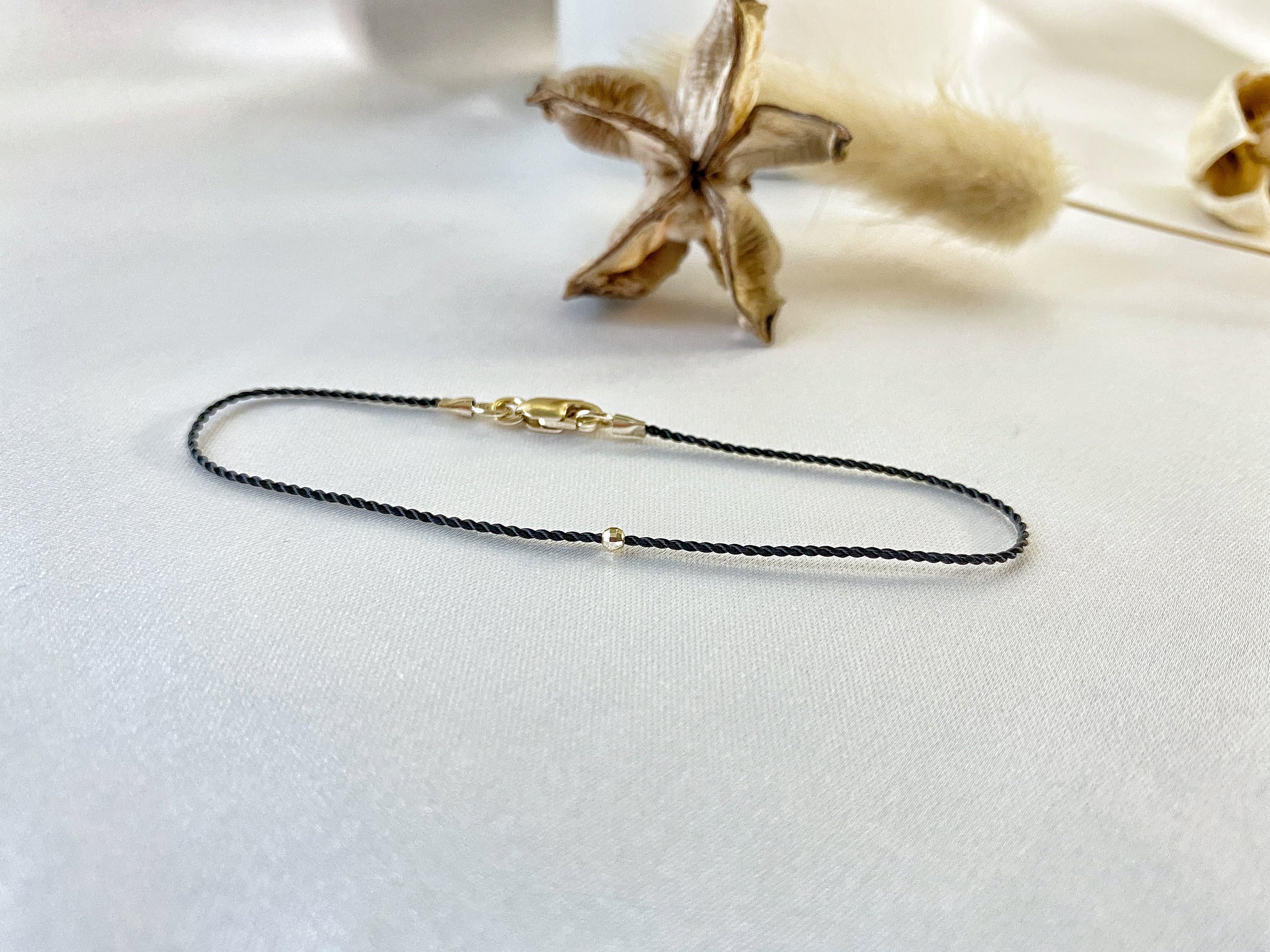 Lobster clasp and 14k gold bead bracelet